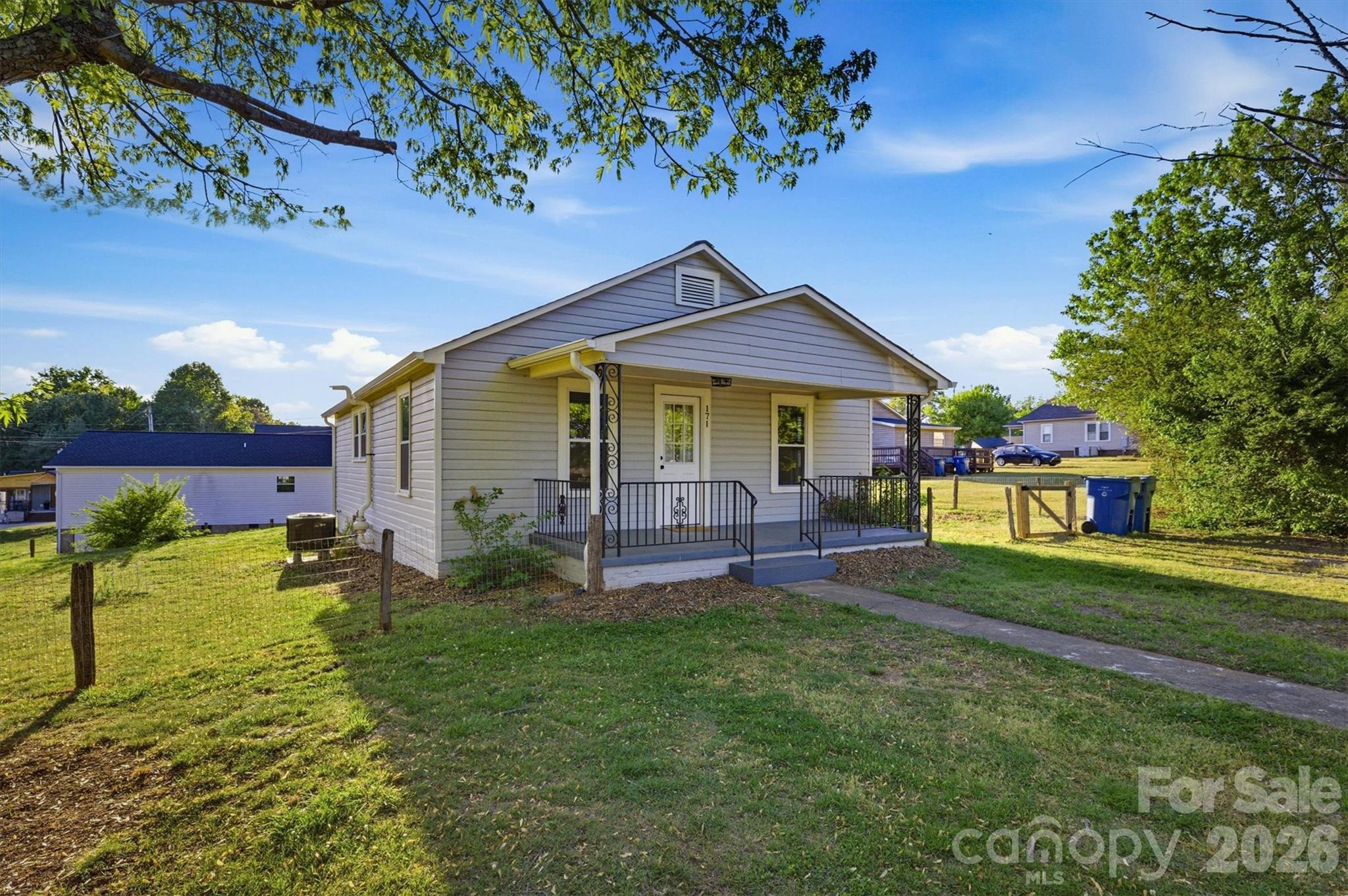 171 Duke Street Granite Falls, NC 28630 - Photo 3 of 15 a house view with a garden space