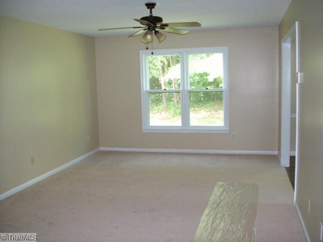 532 Apple Ridge Road Greensboro, NC 27406 - Photo 2 of 8 Living Room. New carpet, paint, ceiling fan.