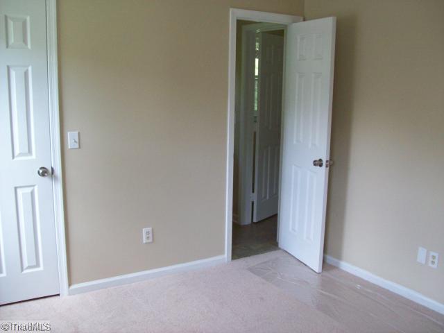 532 Apple Ridge Road Greensboro, NC 27406 - Photo 7 of 8 Master Bedroom. New paint, carpet, light fixture.