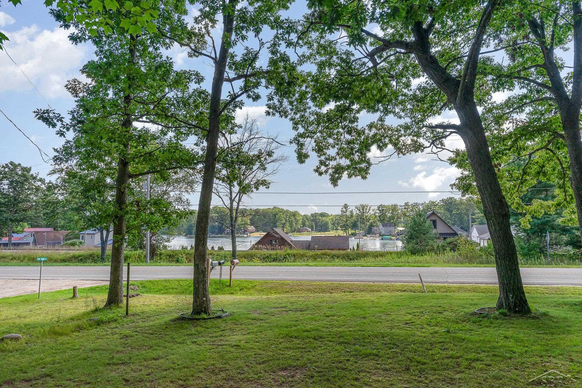 3788 Cedar Road Harrison, MI 48625 - Photo 3 of 20 Peek a boo view of Lake George