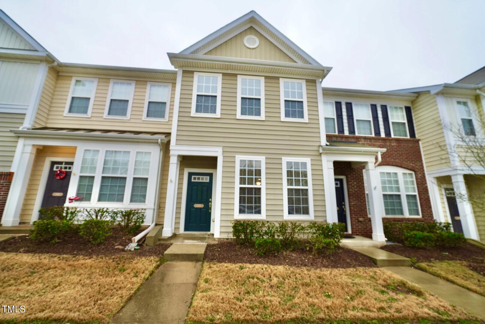 7815 Silverthread Lane Raleigh, NC 27617 - Photo 1 of 32 front view of a brick house
