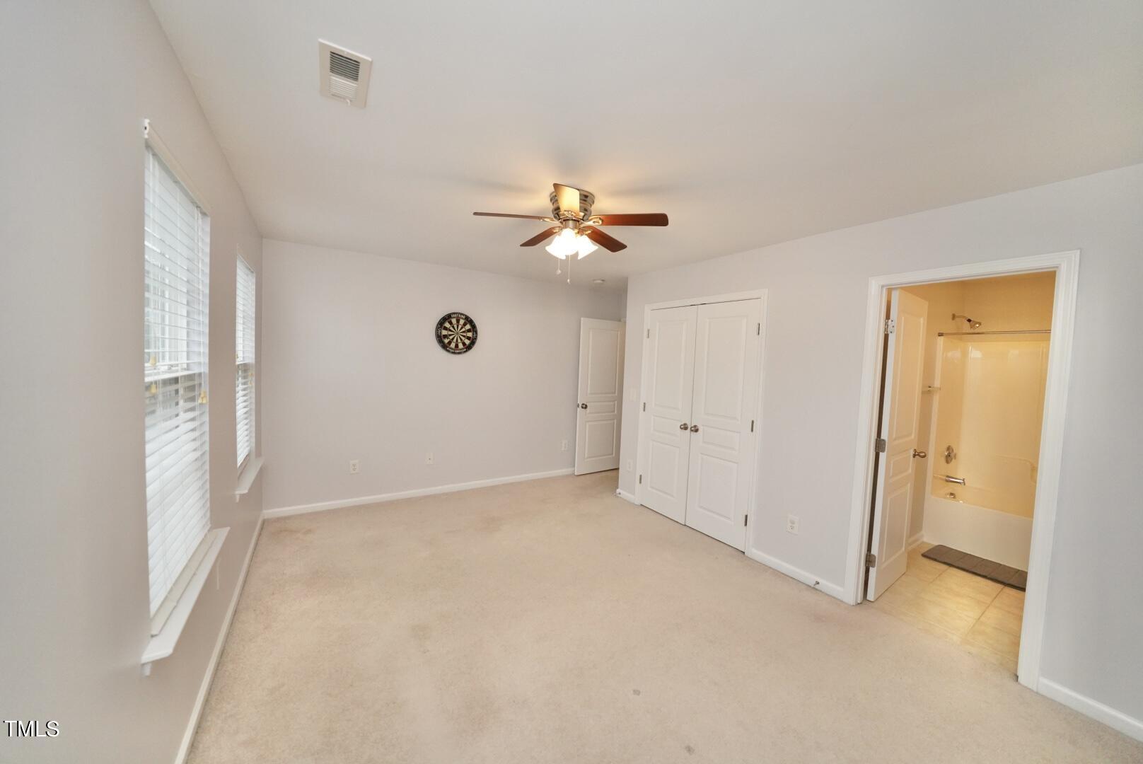 7815 Silverthread Lane Raleigh, NC 27617 - Photo 23 of 32 a view of an empty room with a window