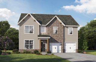 207 Sage Street Commerce, GA 30529 - Photo 5 of 15 a front view of a house with a garden