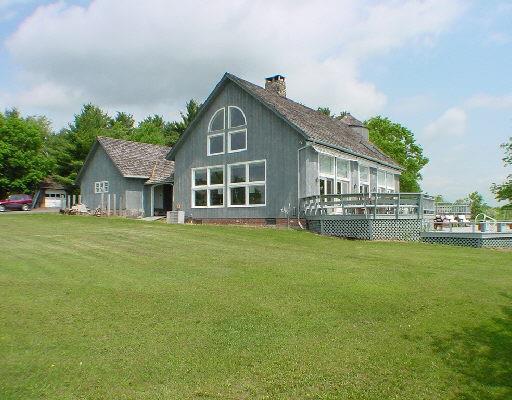 187 Old Mt Tom Road Litchfield, CT 06750 - Photo 1 of 1 a front view of a house with garden