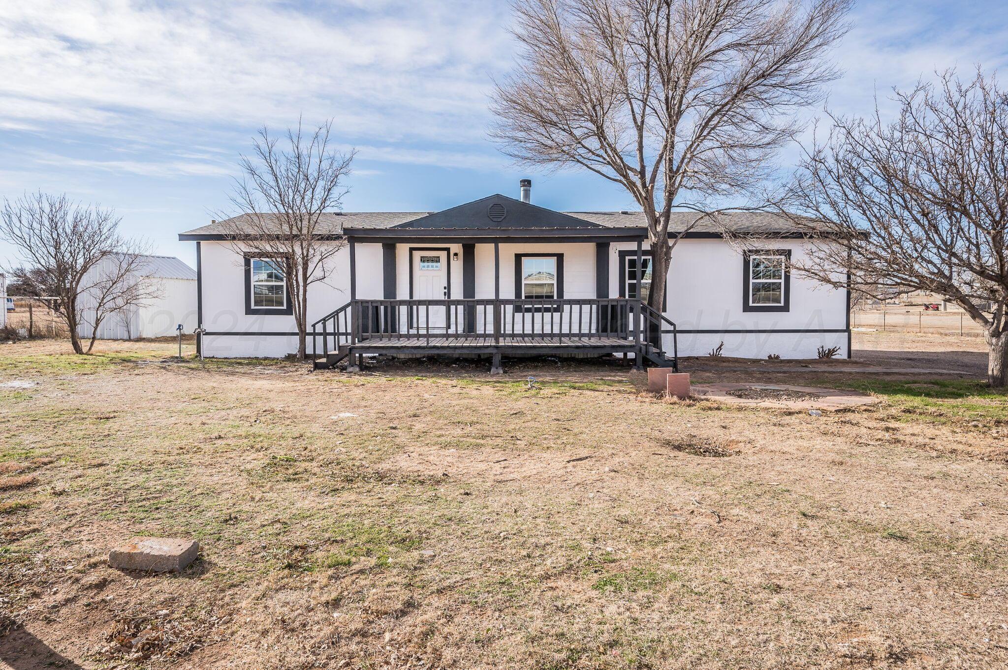 401 West Plantation Road Amarillo, TX 79118 - Photo 1 of 23 a view of a house with a yard