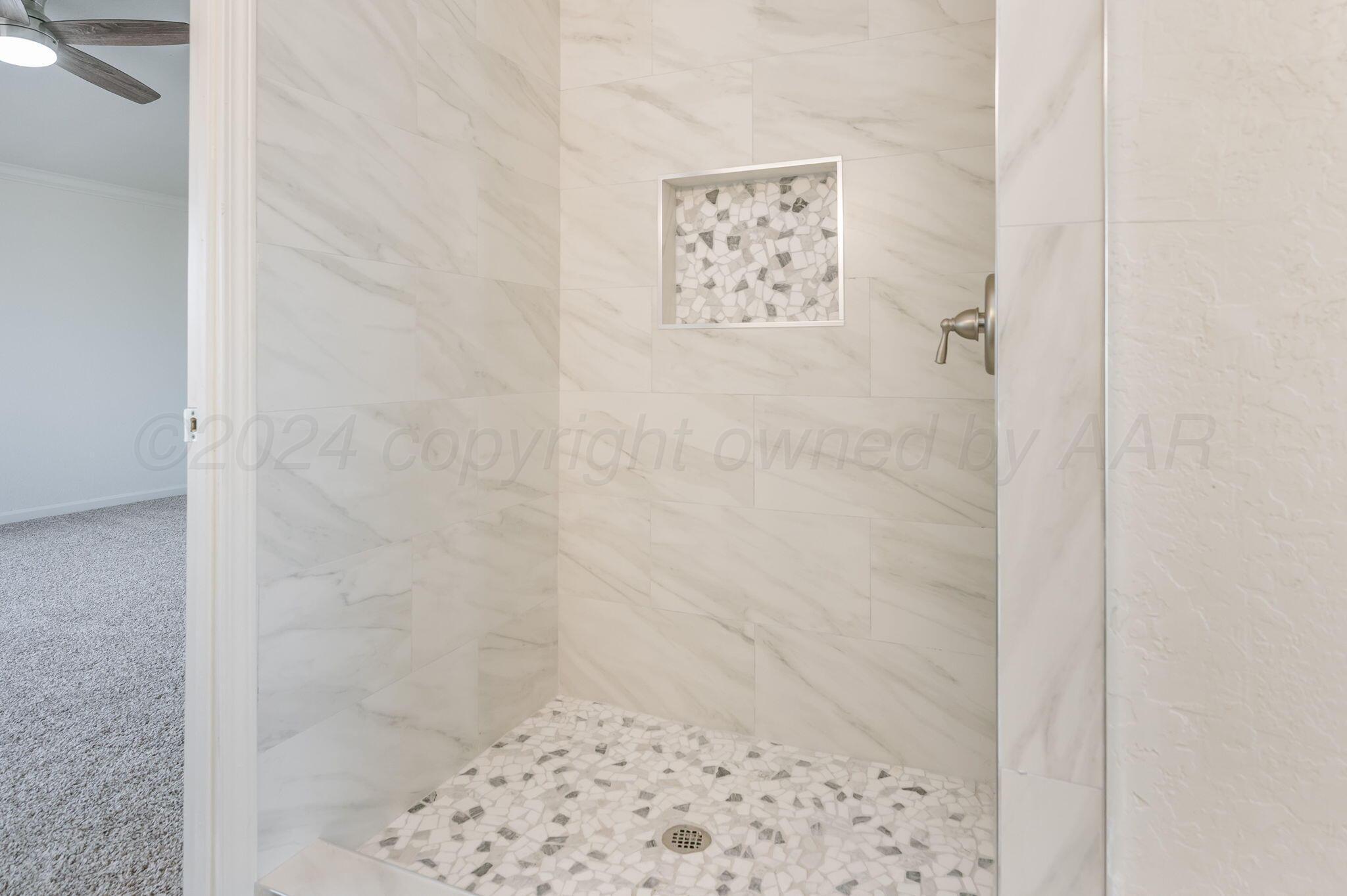 401 West Plantation Road Amarillo, TX 79118 - Photo 15 of 23 a bathroom with a shower