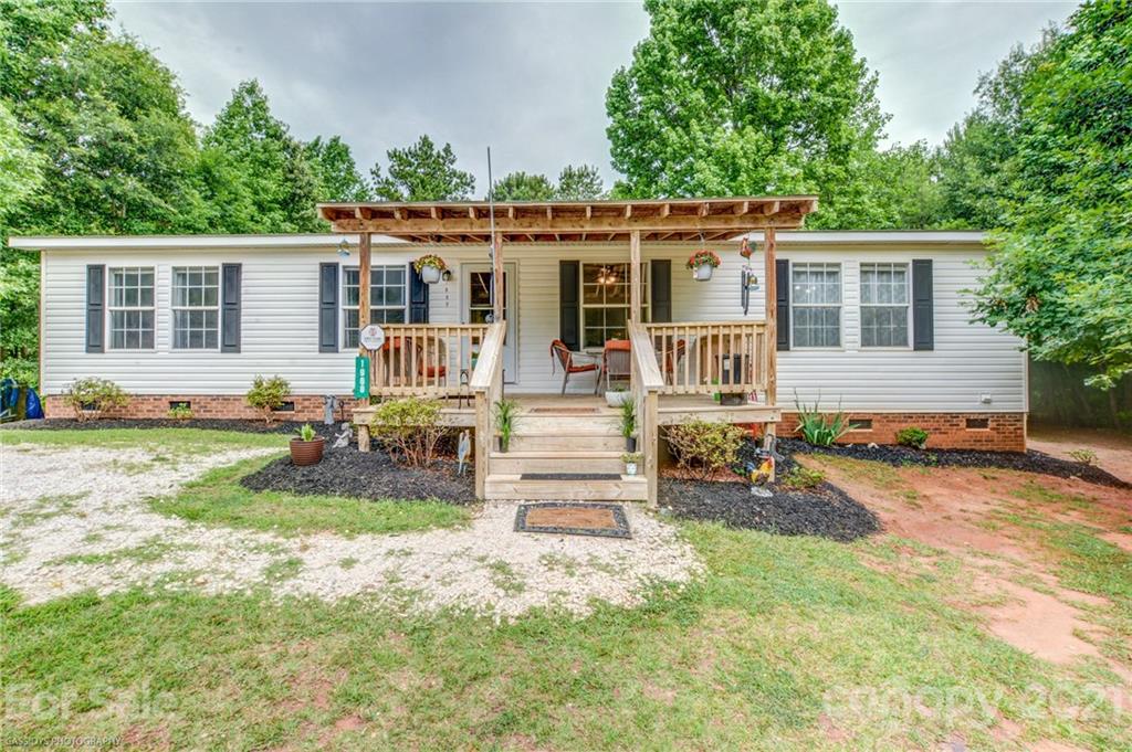 1968 Steel Hill Road Lancaster, SC 29720 - Photo 2 of 28 front view of a house with a patio