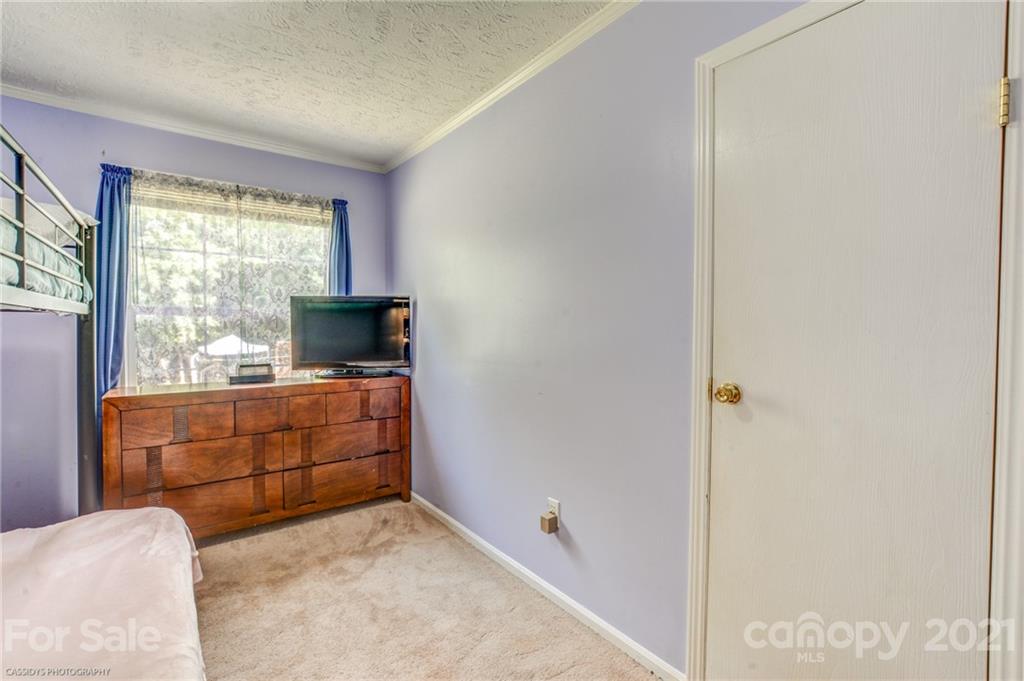 1968 Steel Hill Road Lancaster, SC 29720 - Photo 20 of 28 a room with furniture and a window