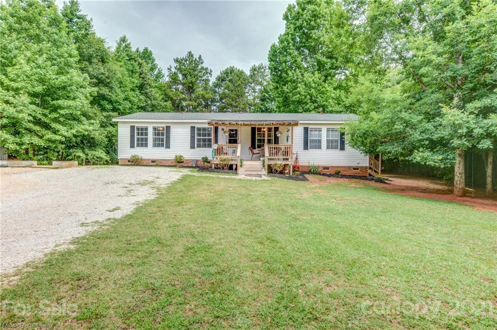 1968 Steel Hill Road Lancaster, SC 29720 - Photo 3 of 28 a house view with a sitting space and garden