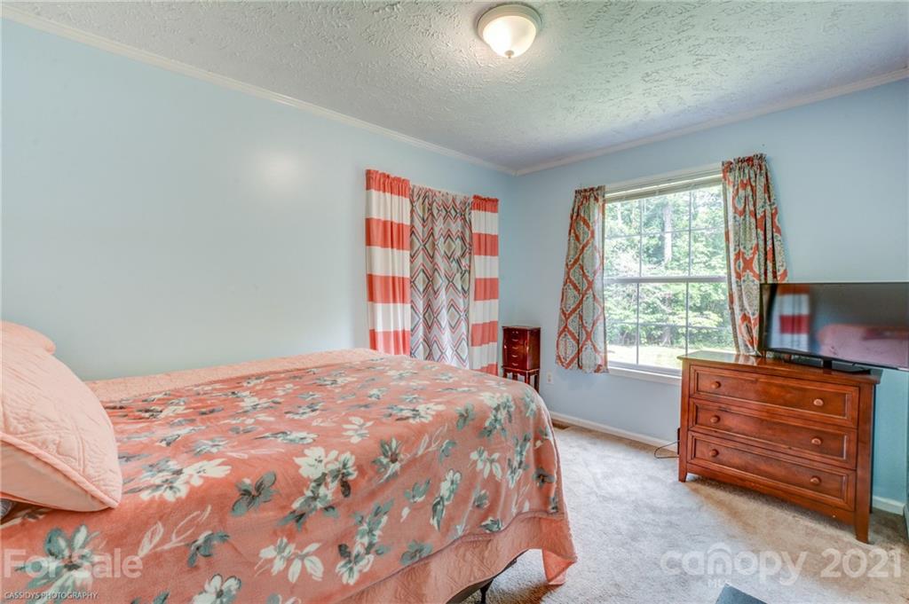 1968 Steel Hill Road Lancaster, SC 29720 - Photo 22 of 28 a bedroom with a bed and a window