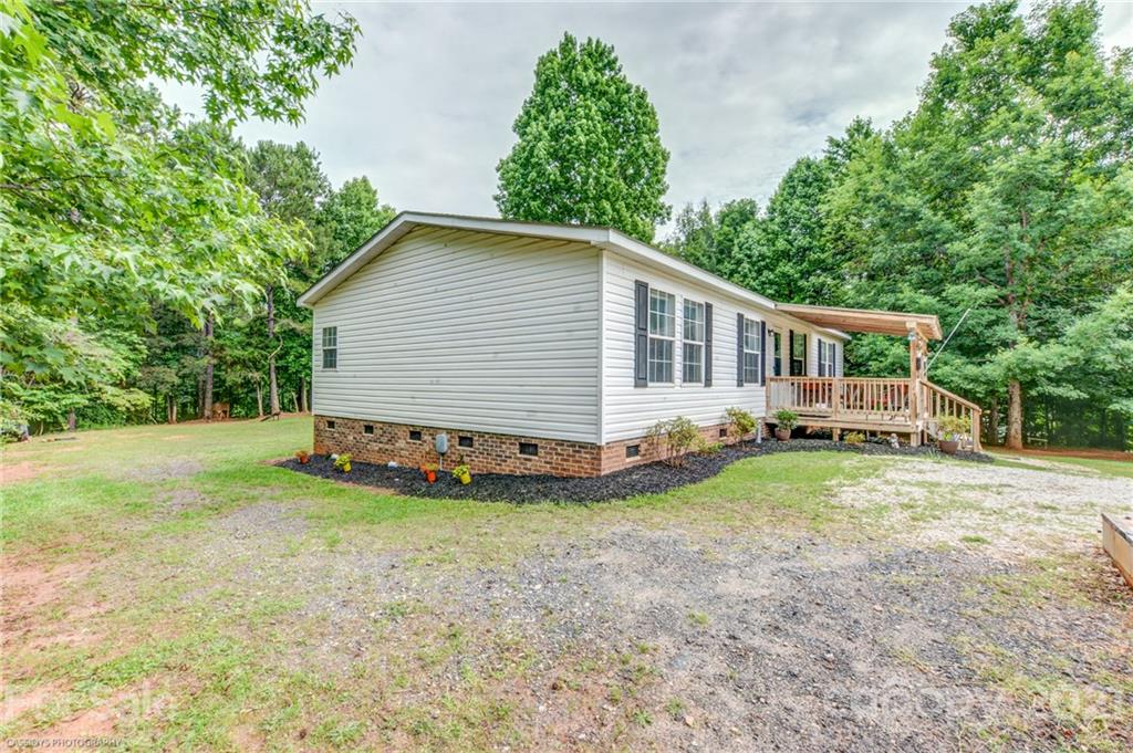 1968 Steel Hill Road Lancaster, SC 29720 - Photo 5 of 28 a view of a house with a yard