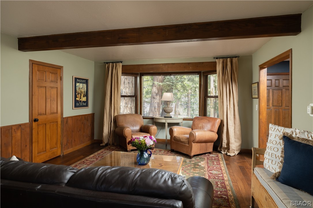 841 Golf Course Road Lake Arrowhead, CA 92352 - Photo 11 of 43 a living room with furniture and a window