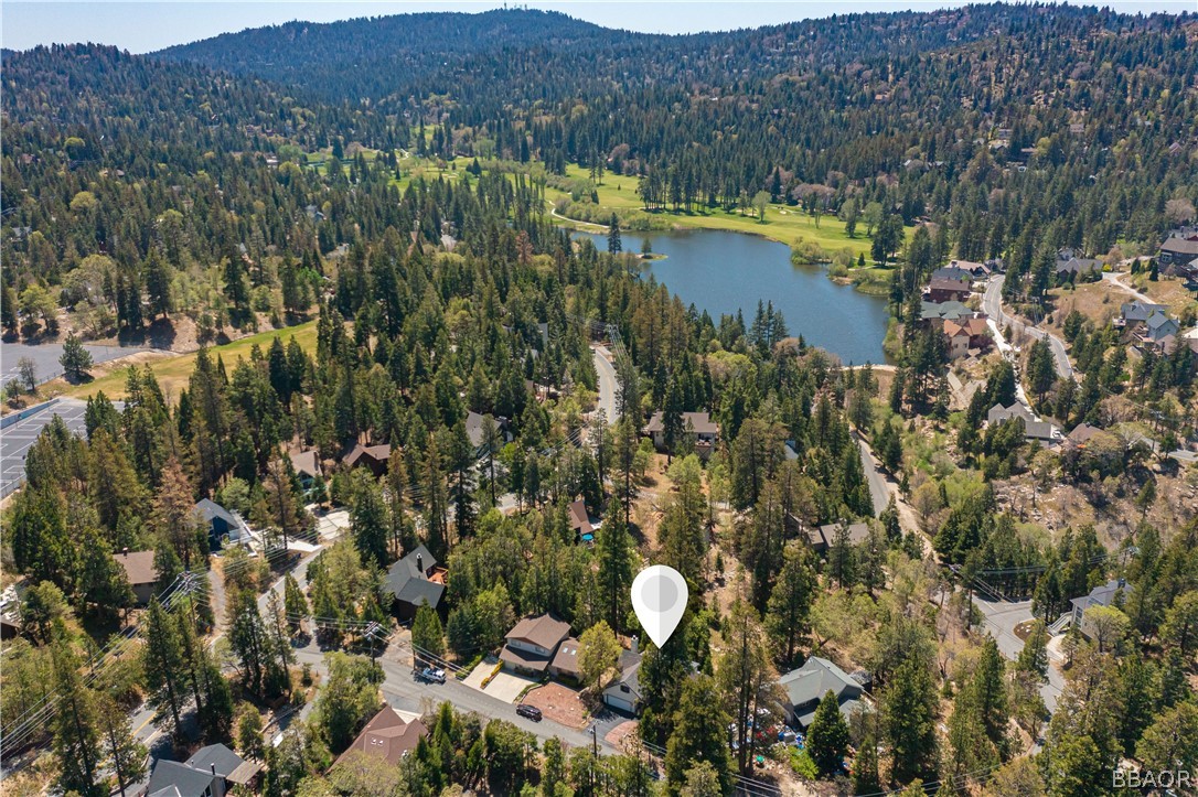 841 Golf Course Road Lake Arrowhead, CA 92352 - Photo 41 of 43 a view of a city and mountains in a field
