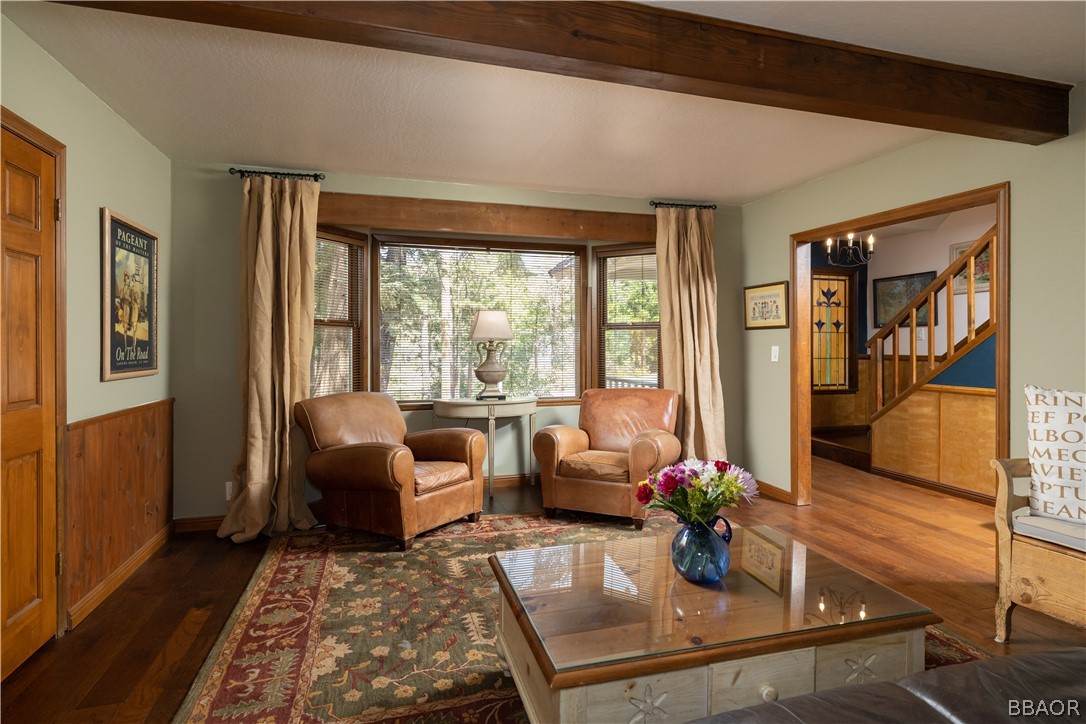 841 Golf Course Road Lake Arrowhead, CA 92352 - Photo 6 of 43 a living room with furniture and a floor to ceiling window