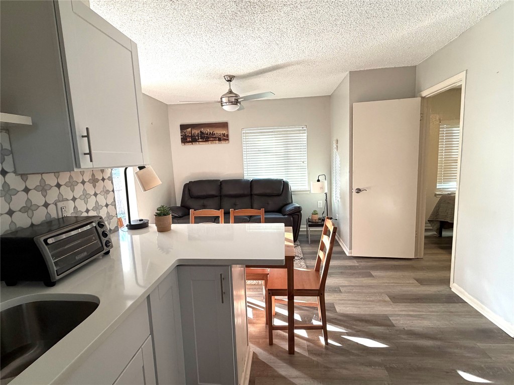 2208 Garden Street, Unit B Austin, TX 78702 - Photo 10 of 10 a bedroom with a bed and a couch