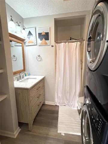 a bedroom with a bed and a walk in closet