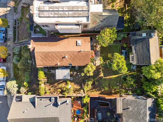 a aerial view of a house with a garden
