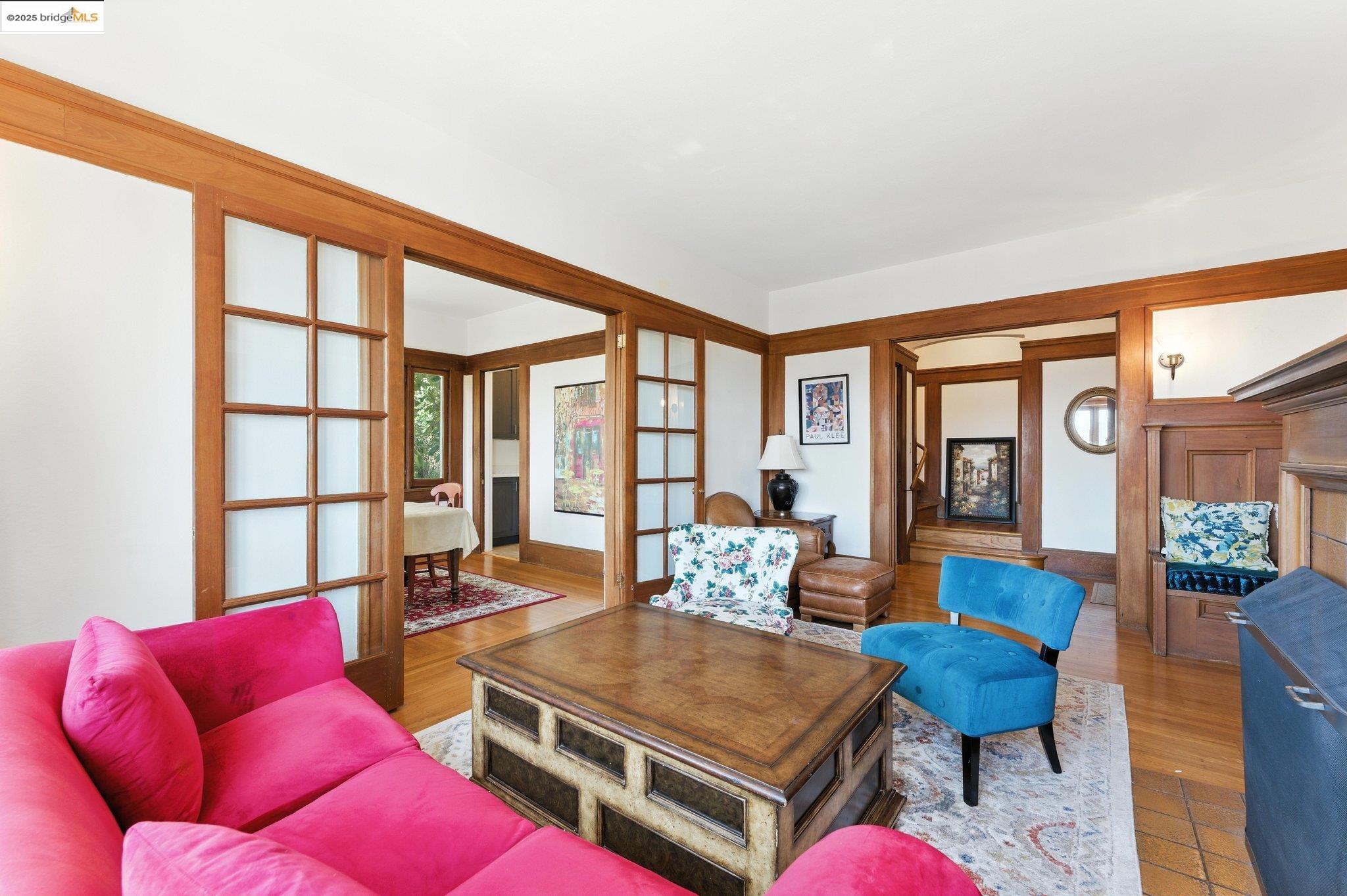 7 Panoramic Way Berkeley, CA 94704 - Photo 12 of 47 a living room with furniture and a large window