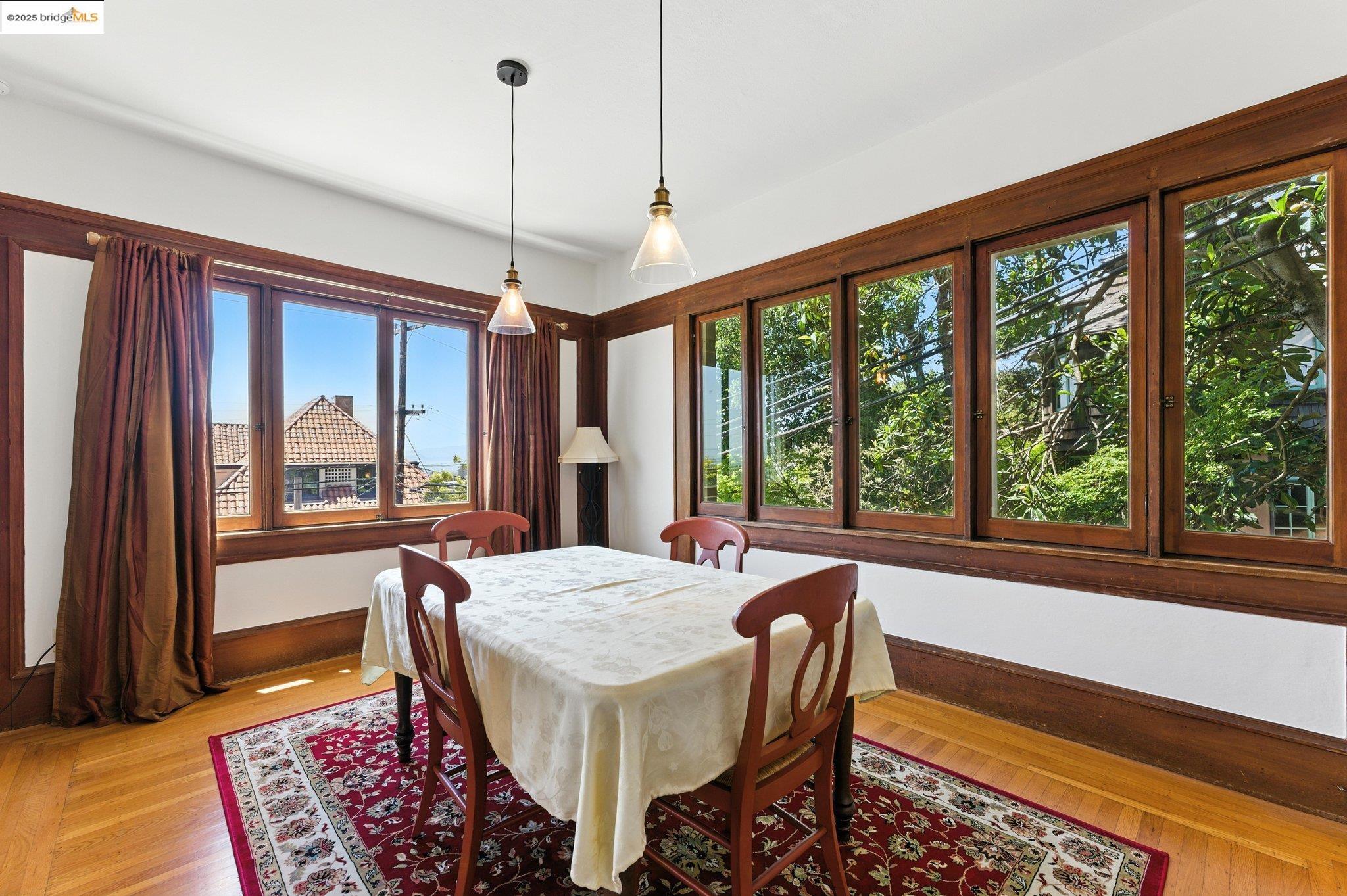 7 Panoramic Way Berkeley, CA 94704 - Photo 15 of 47 a living room with furniture and a window