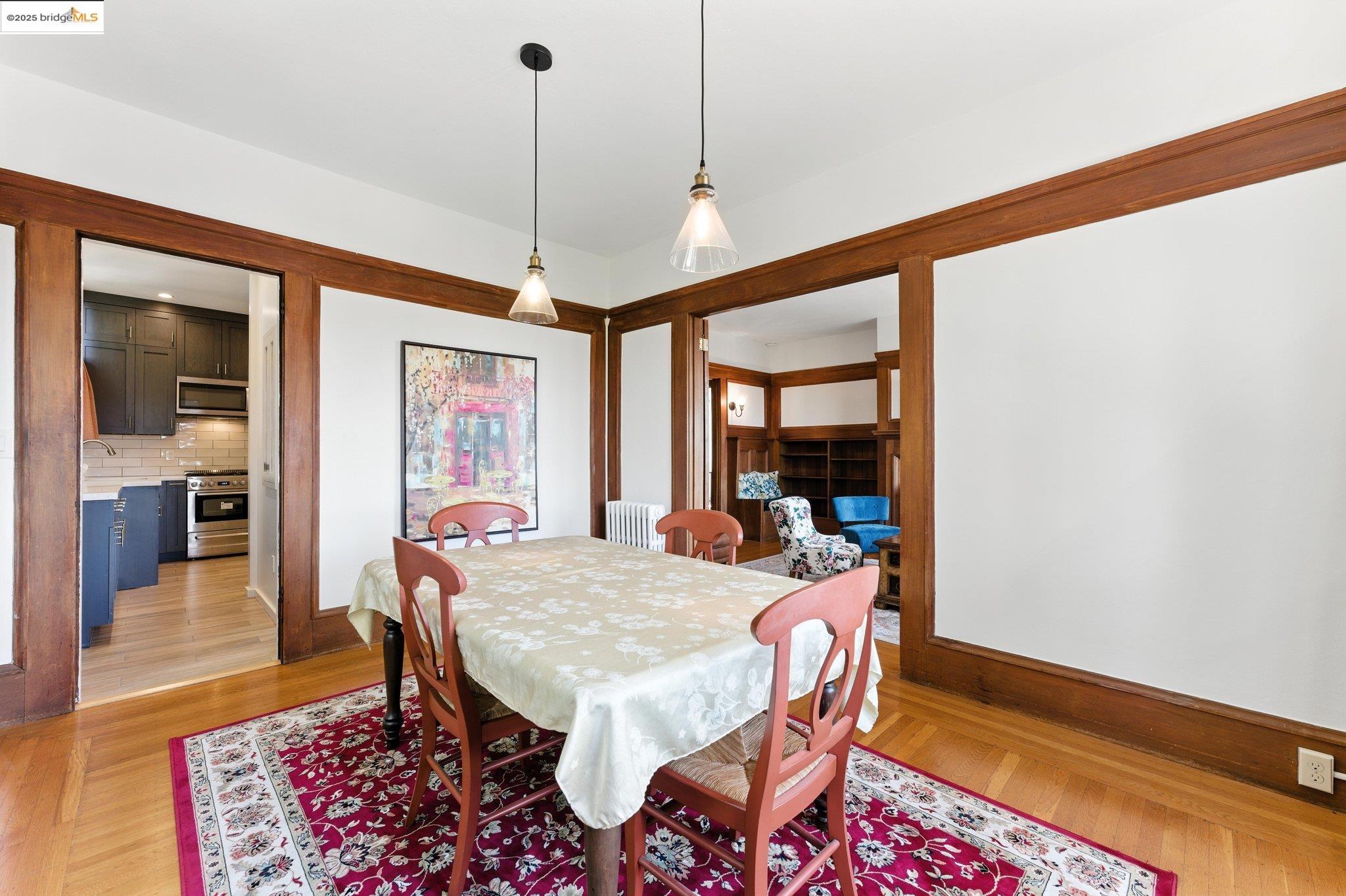 7 Panoramic Way Berkeley, CA 94704 - Photo 16 of 47 a view of a dining room with furniture window and wooden floor