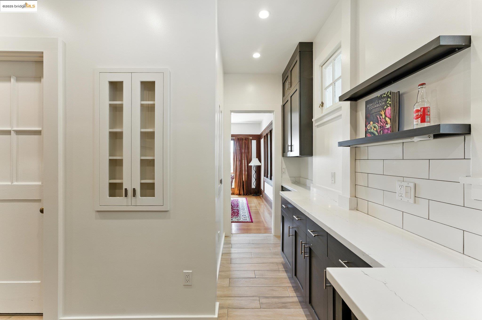 7 Panoramic Way Berkeley, CA 94704 - Photo 18 of 47 a hallway with cabinets