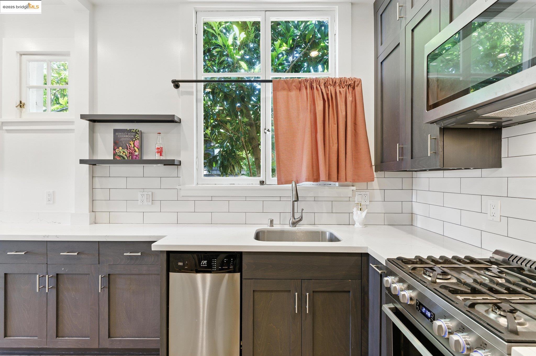 7 Panoramic Way Berkeley, CA 94704 - Photo 20 of 47 a kitchen with a sink cabinets and a window