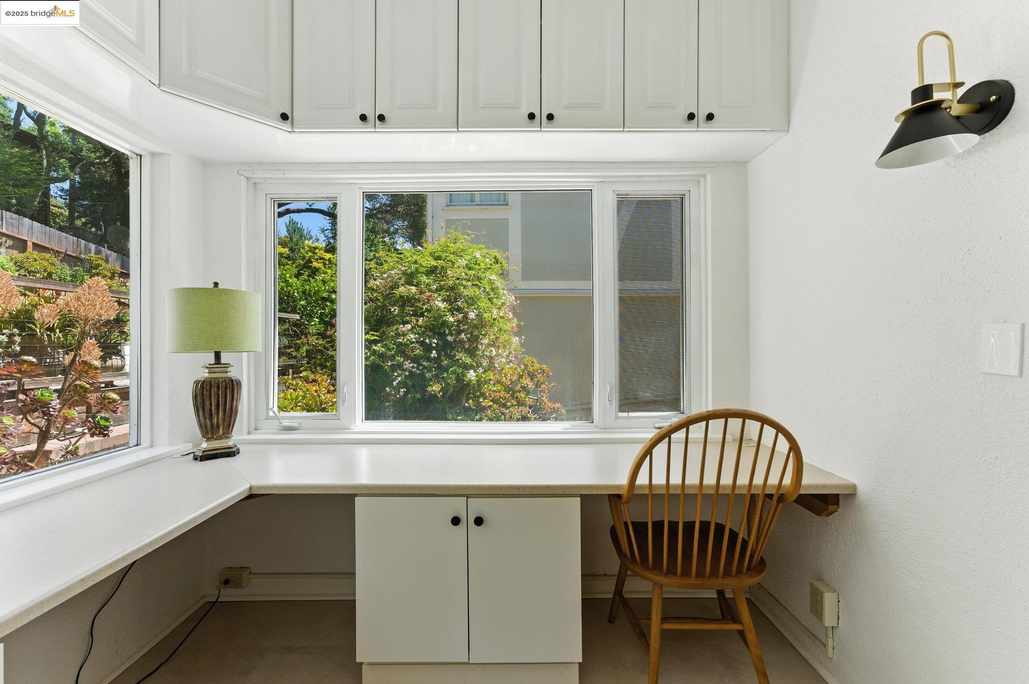 7 Panoramic Way Berkeley, CA 94704 - Photo 32 of 47 a view of a chair and table in balcony with wooden floor