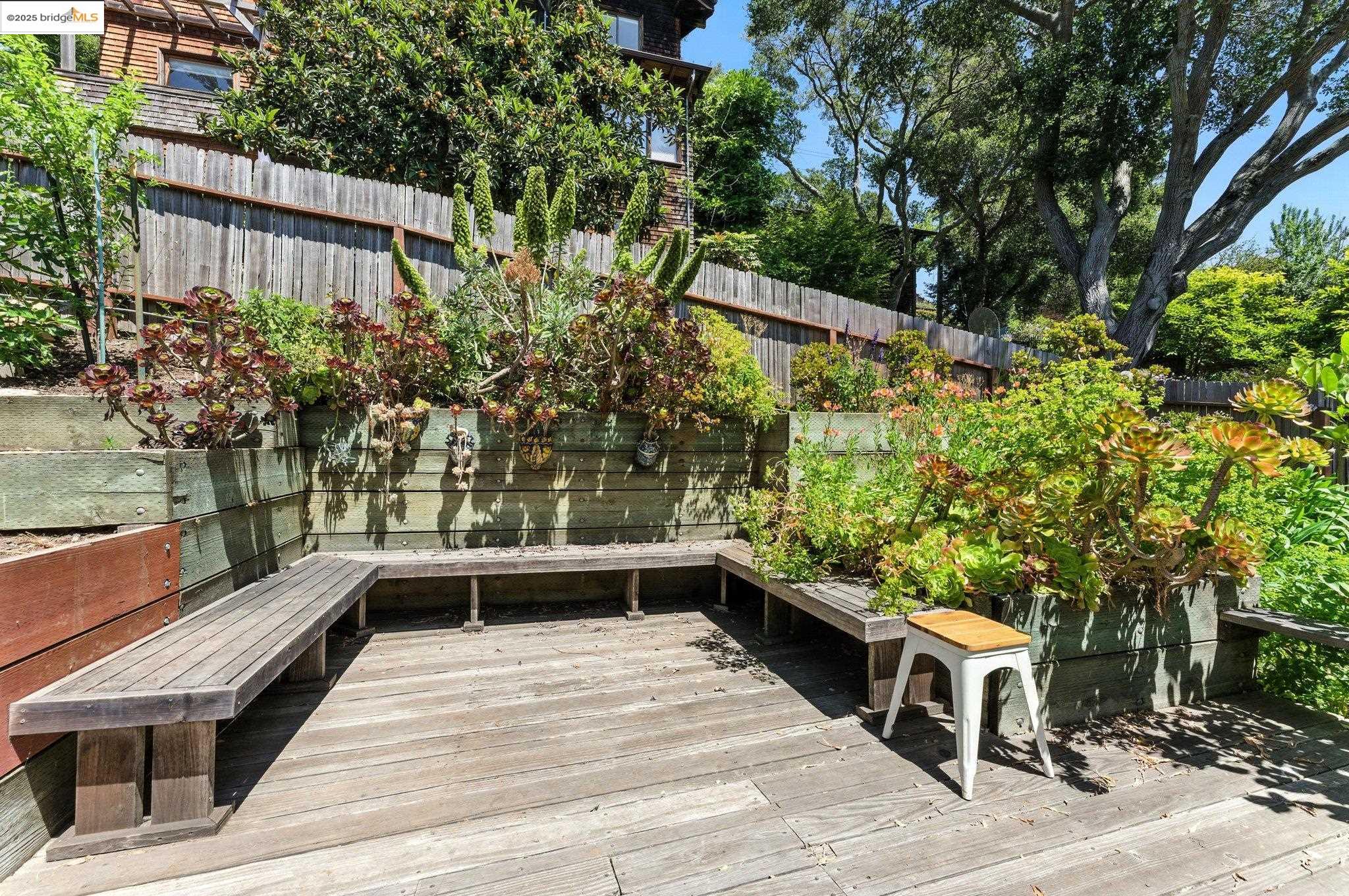 7 Panoramic Way Berkeley, CA 94704 - Photo 38 of 47 a view of balcony with potted plants and wooden fence