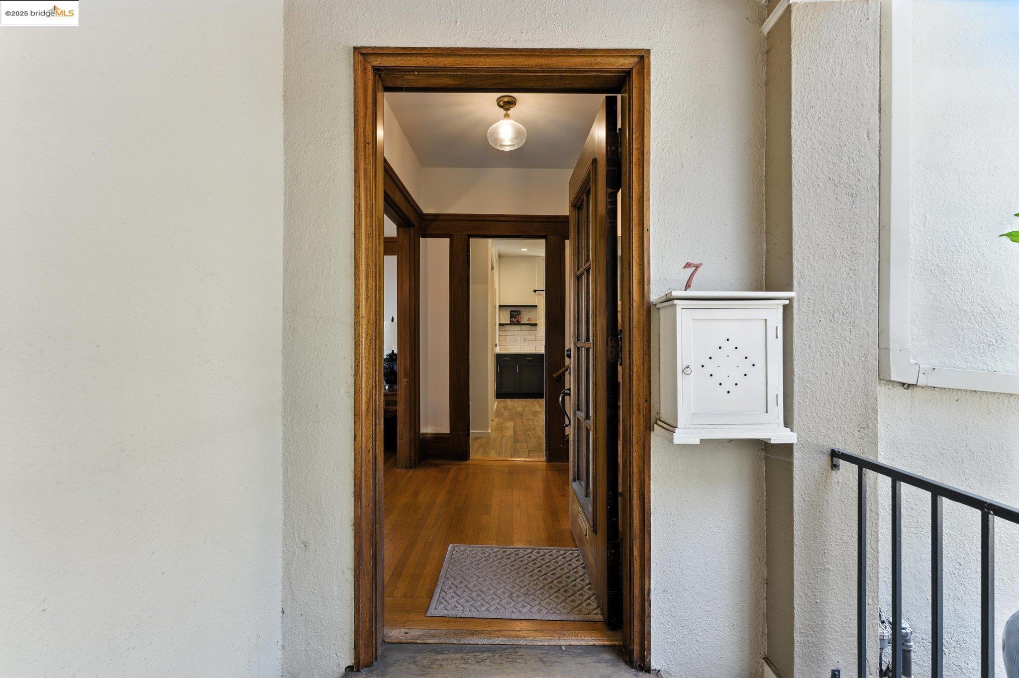 7 Panoramic Way Berkeley, CA 94704 - Photo 4 of 47 a view of a hallway with wooden floor