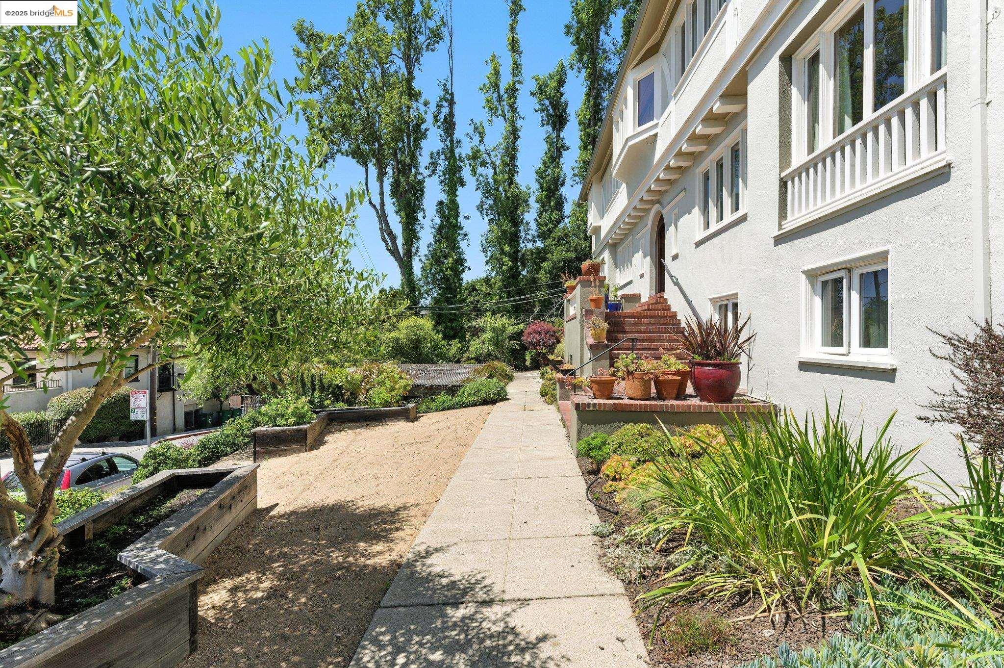 7 Panoramic Way Berkeley, CA 94704 - Photo 44 of 47 a view of a pathway with a garden