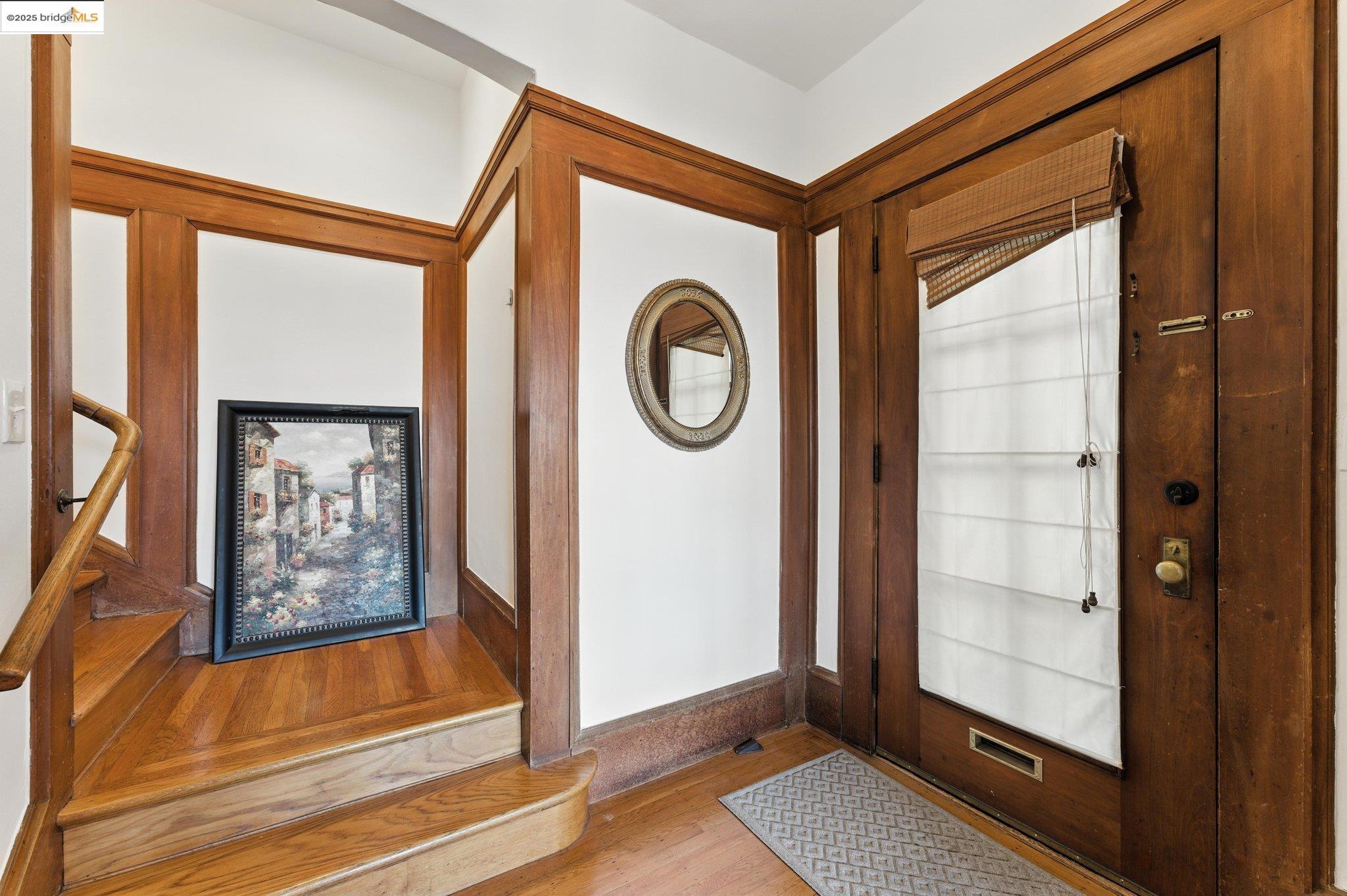 7 Panoramic Way Berkeley, CA 94704 - Photo 6 of 47 a view of an entryway with a door and wooden floor