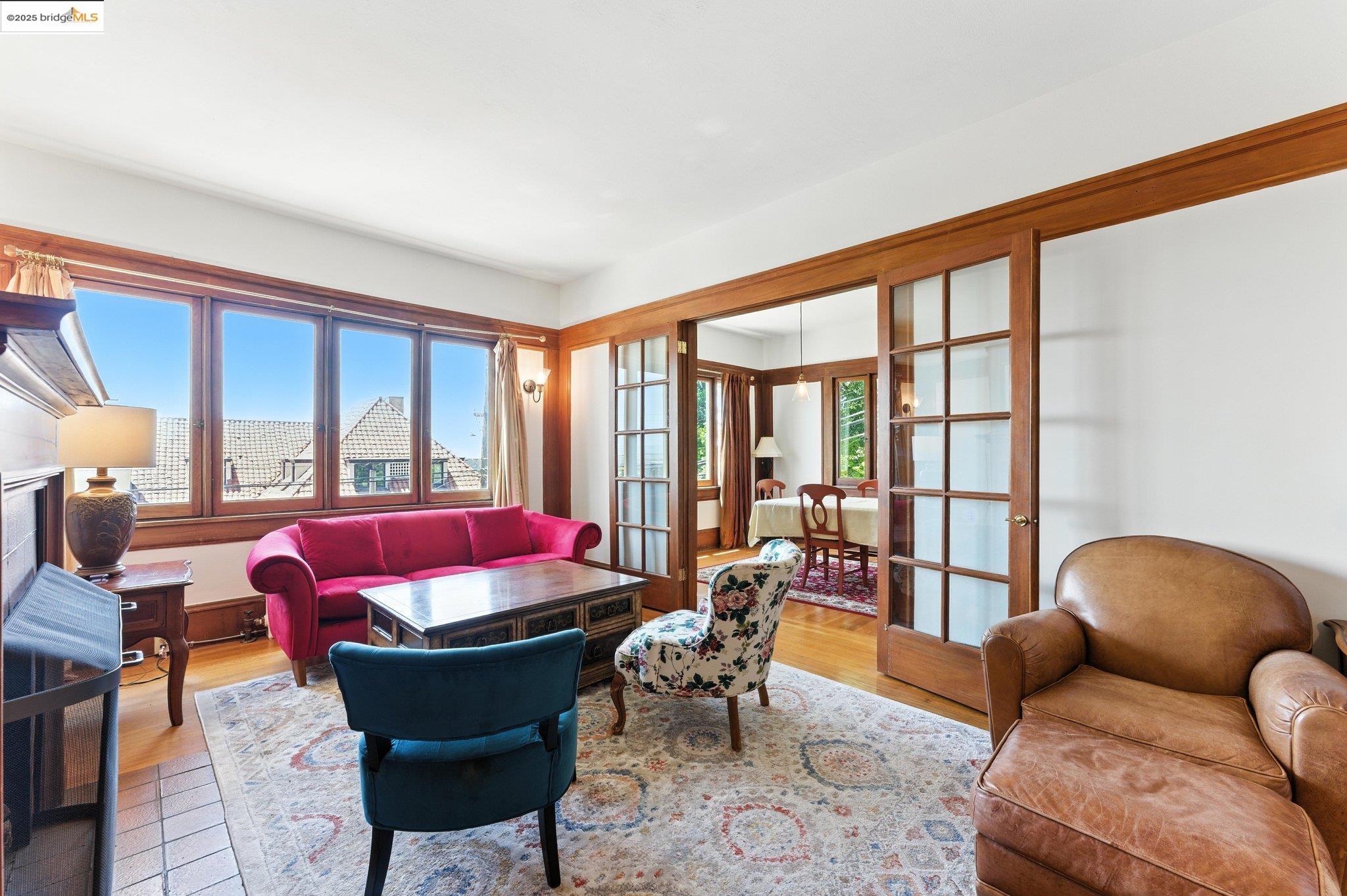 7 Panoramic Way Berkeley, CA 94704 - Photo 10 of 47 a living room with furniture and a large window