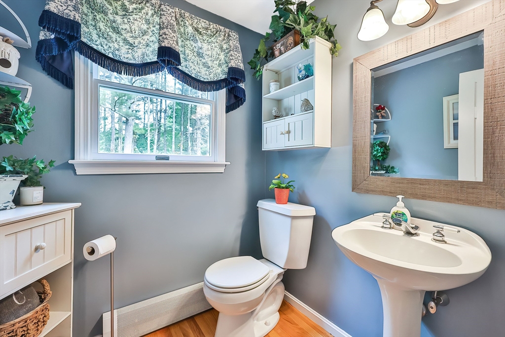 11 Puddingstone Lane Medway, MA 02053 - Photo 17 of 40 a bathroom with a sink toilet and a mirror
