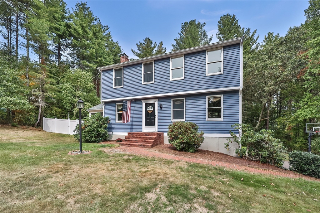 11 Puddingstone Lane Medway, MA 02053 - Photo 2 of 40 a front view of a house with a yard
