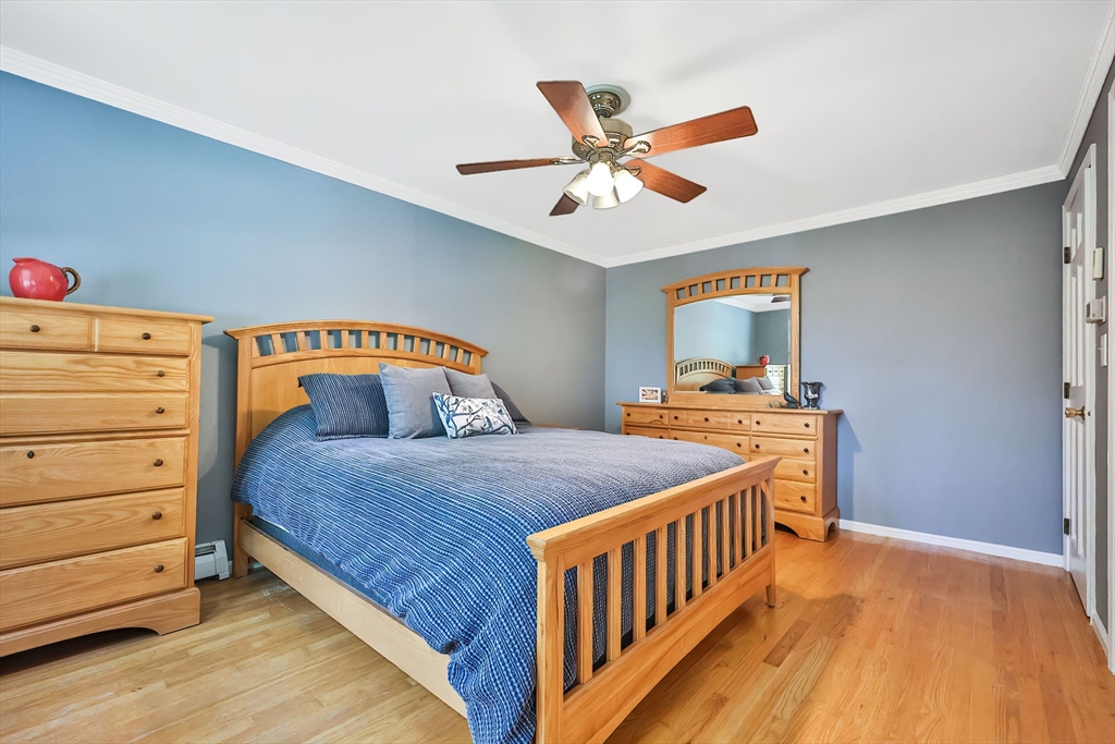 11 Puddingstone Lane Medway, MA 02053 - Photo 21 of 40 a bedroom with a bed and a dresser