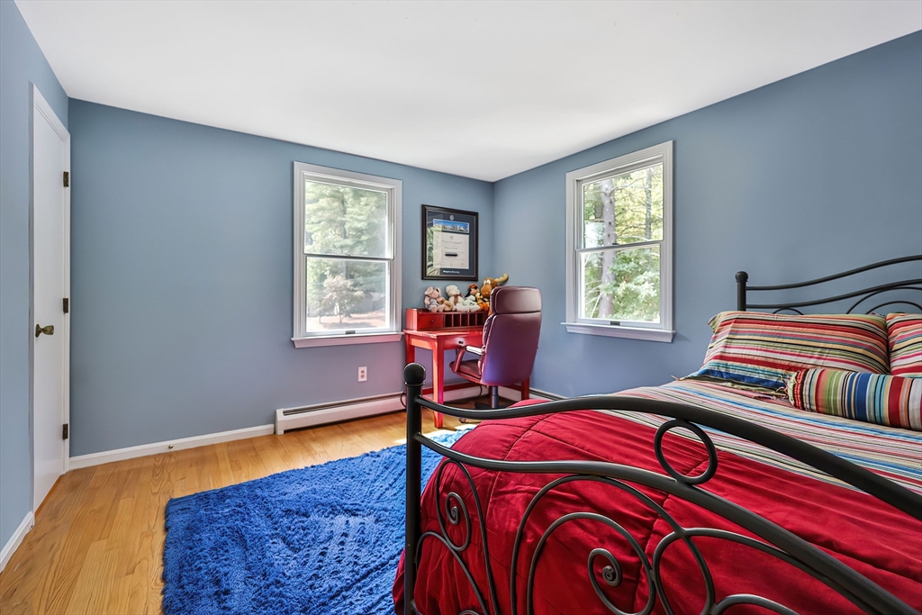 11 Puddingstone Lane Medway, MA 02053 - Photo 22 of 40 a bedroom with furniture and a window