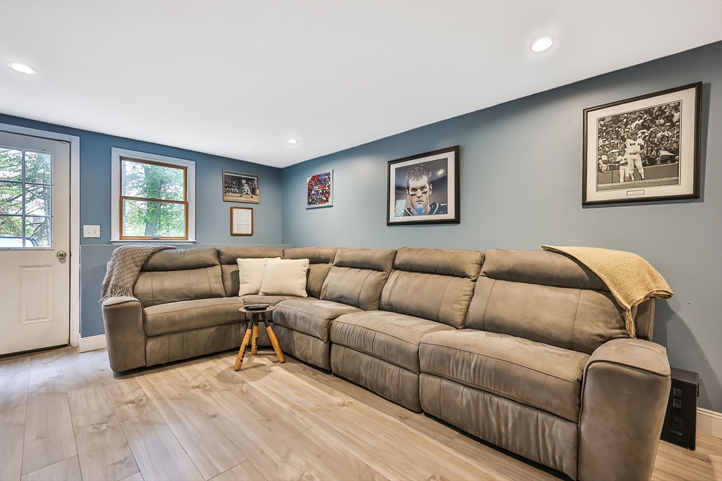 11 Puddingstone Lane Medway, MA 02053 - Photo 30 of 40 a living room with furniture and a large window