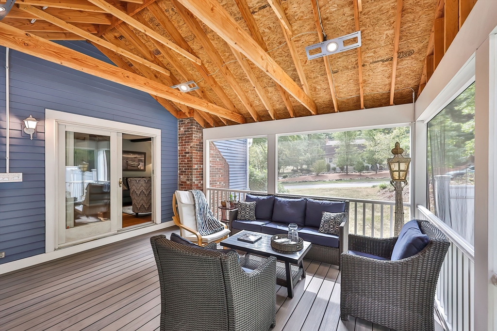 11 Puddingstone Lane Medway, MA 02053 - Photo 34 of 40 a living room with furniture and a floor to ceiling window