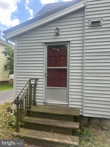 a view of a house with a large window