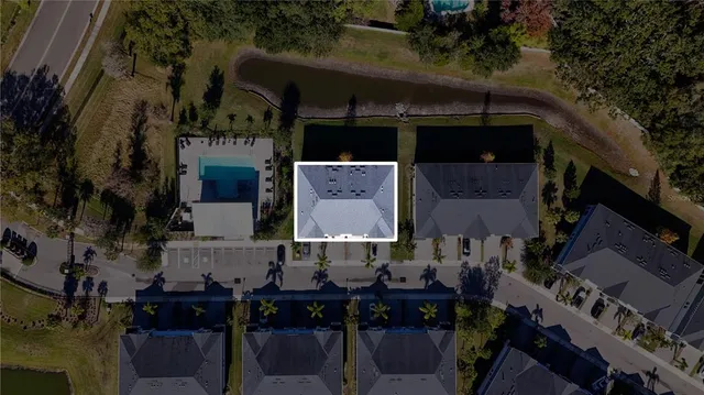 an aerial view of houses with outdoor space