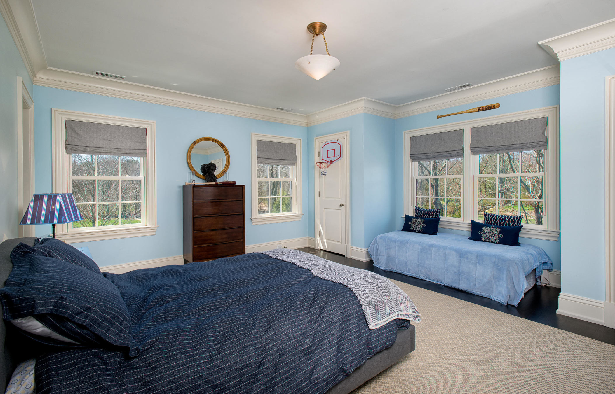 1480 Ponus Ridge Road New Canaan, CT 06840 - Photo 15 of 22 a spacious bedroom with a bed and a window