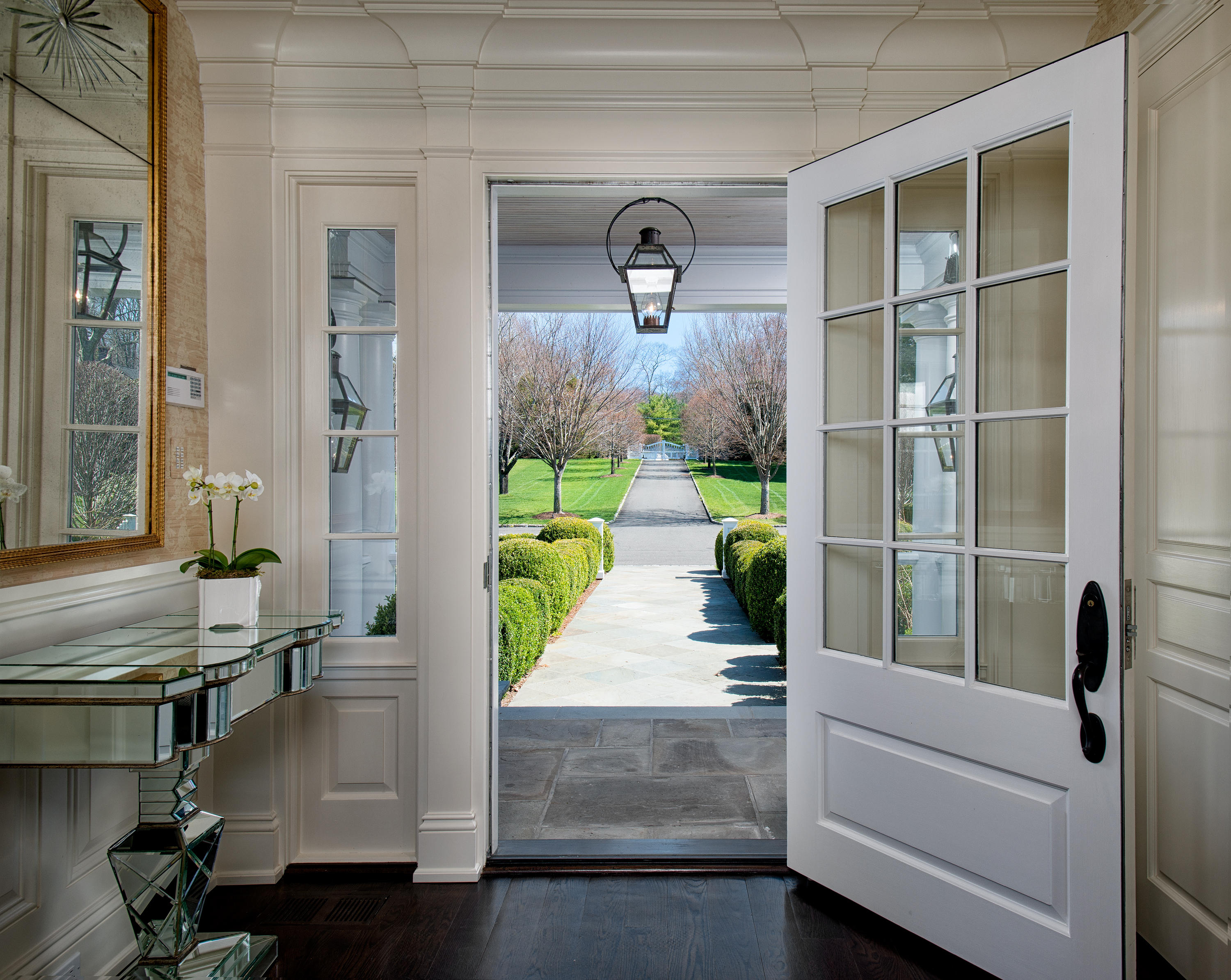1480 Ponus Ridge Road New Canaan, CT 06840 - Photo 2 of 22 a view of entryway and hall with wooden floor