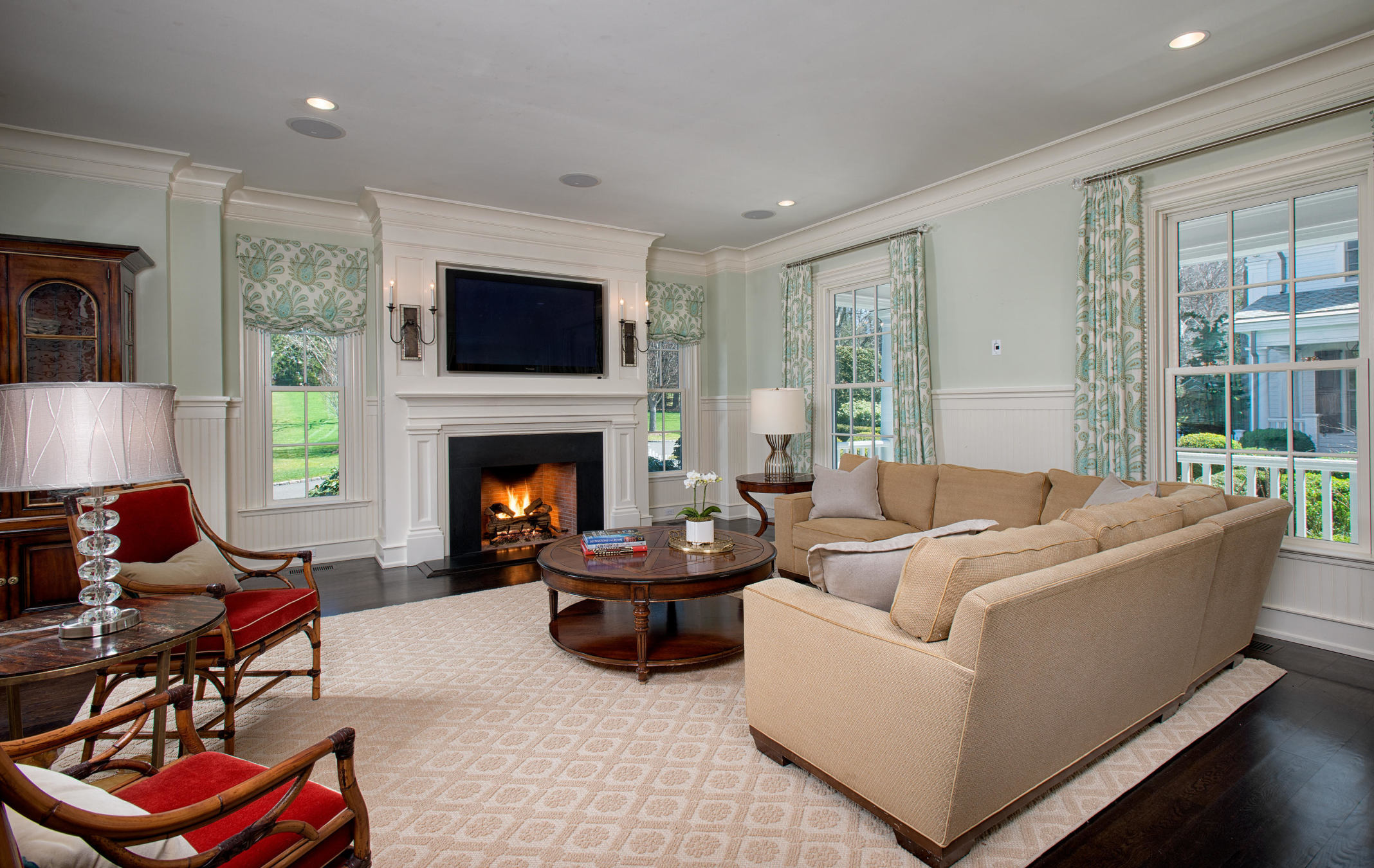 1480 Ponus Ridge Road New Canaan, CT 06840 - Photo 9 of 22 a living room with furniture and a fireplace
