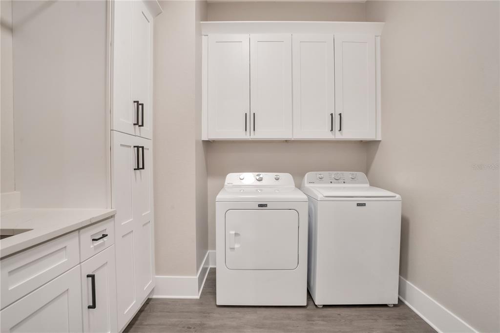 440 Palma Ceia Road Winter Haven, FL 33884 - Photo 50 of 78 a utility room with dryer and washer