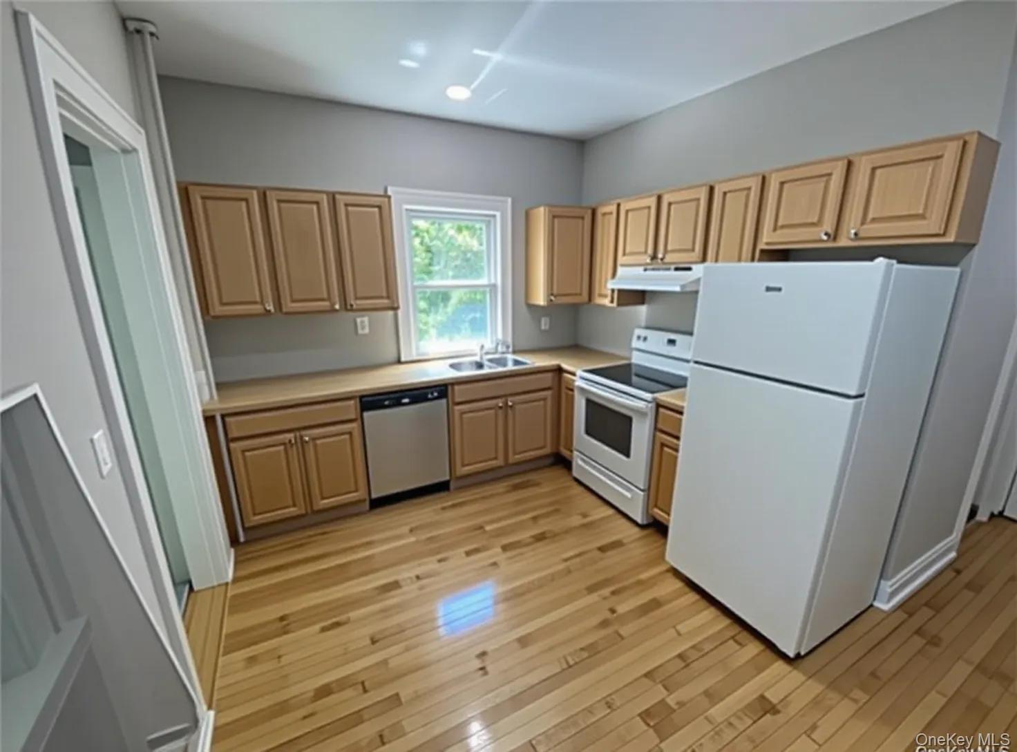 762 Old Rte 22 Amenia, NY 12501 - Photo 15 of 25 a kitchen with stainless steel appliances a refrigerator sink and cabinets