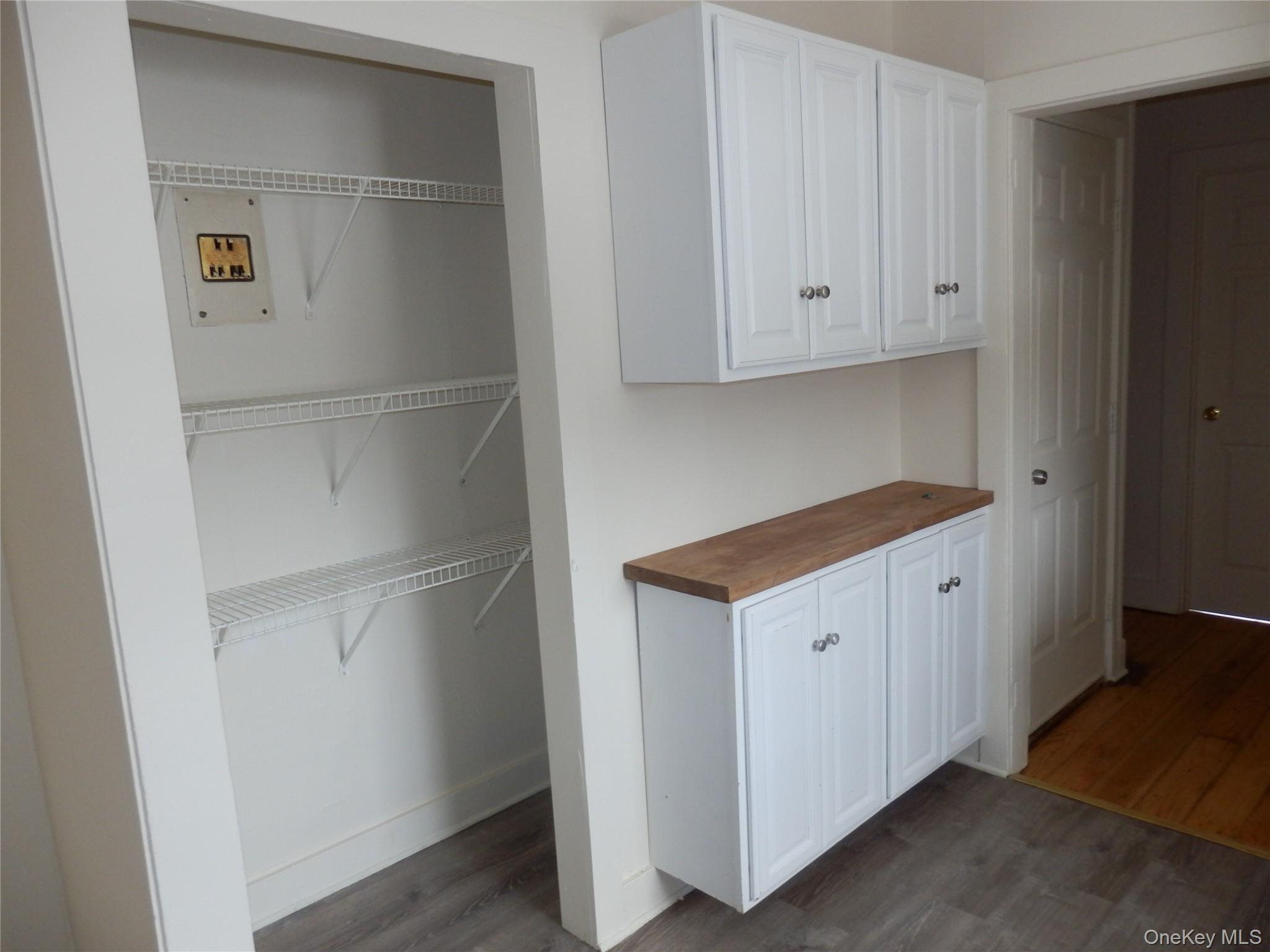 762 Old Rte 22 Amenia, NY 12501 - Photo 17 of 25 a kitchen with white cabinets and white appliances