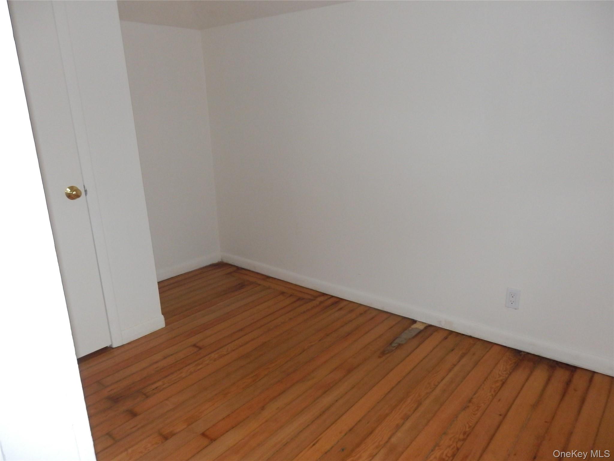 762 Old Rte 22 Amenia, NY 12501 - Photo 23 of 25 a view of an empty room with wooden floor