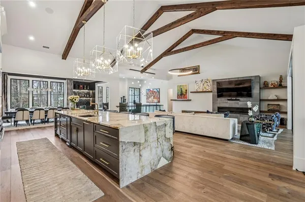 a large kitchen with stainless steel appliances granite countertop lots of counter top space