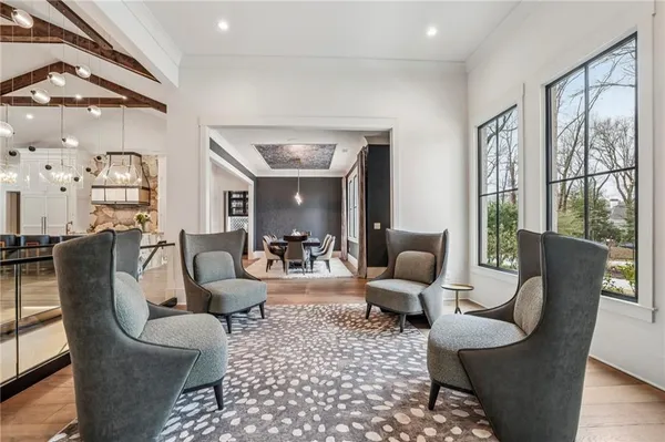 a living room with furniture or outdoor view and a large window