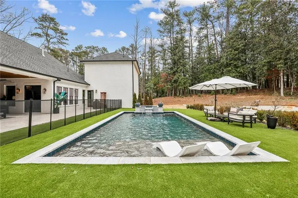 a backyard of a house with lots of green space